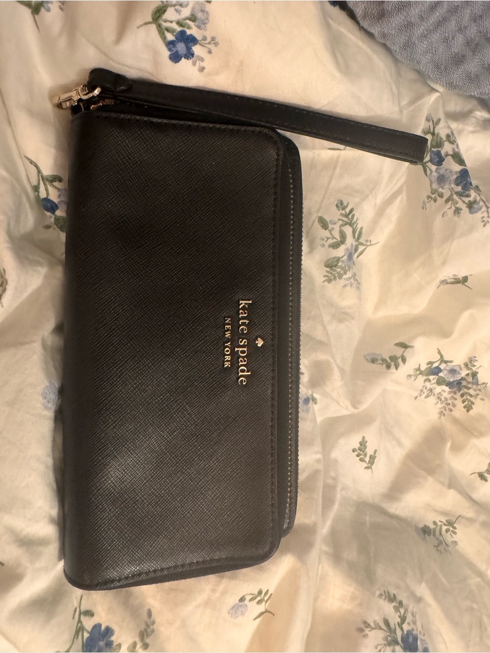 kate spade black leather zip wristlet with gold logo